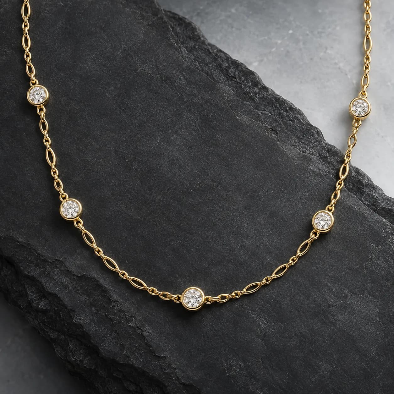 Concept of a yellow gold diamond station necklace